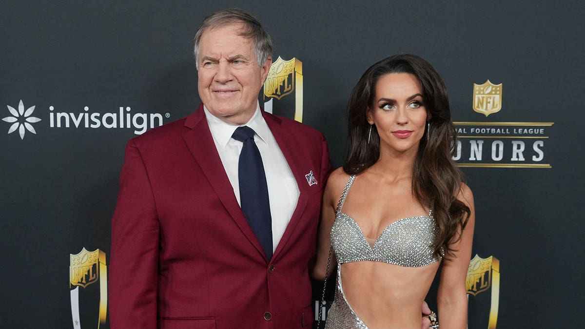 Bill Belichick, Jordon Hudson, Belichick Inc., Trouble Cub Enterprises, NFL, New England Patriots, Hard Knocks, CBS News, Tony Dokoupil, Dunkin' Super Bowl Commercial, Ben Affleck, Casey Affleck, North Carolina Tar Heels, trademarks, NFL Honors, social media, celebrity relationship, sports business, executive producer
