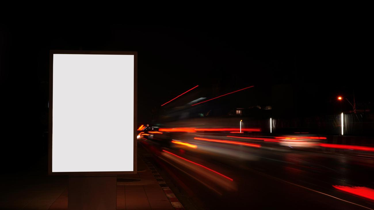 commuting, advertising, bike commute, billboards, posters, street advertising, digital advertising, public advertising, urban landscape, visual pollution, advertising overload, outdoor advertising, advertising screens, advertising on the way to work, cultural advertising, Litfaßsäule
