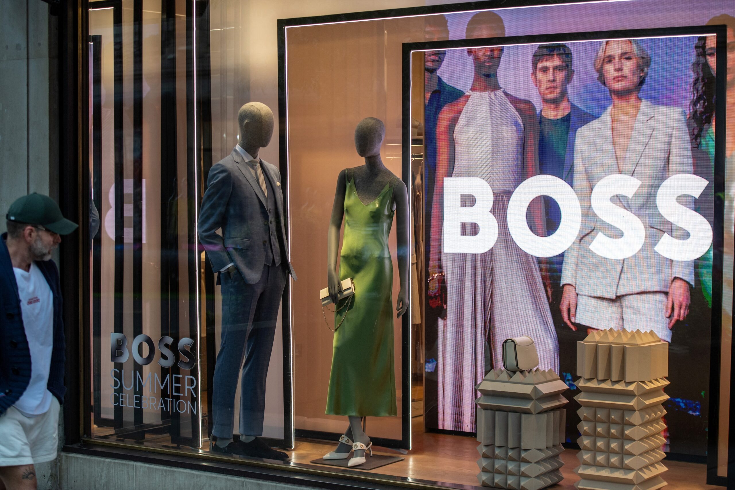 tariffs, US tariffs, European market, retailers, consumer brands, Zalando, Hugo Boss, Mattel, Adidas, Temu, Shein, China, manufacturing, consumer spending, price hikes, global trade, international sales, market competition, import duties, supply chain, economic uncertainty, trade war, retail strategy, e-commerce
