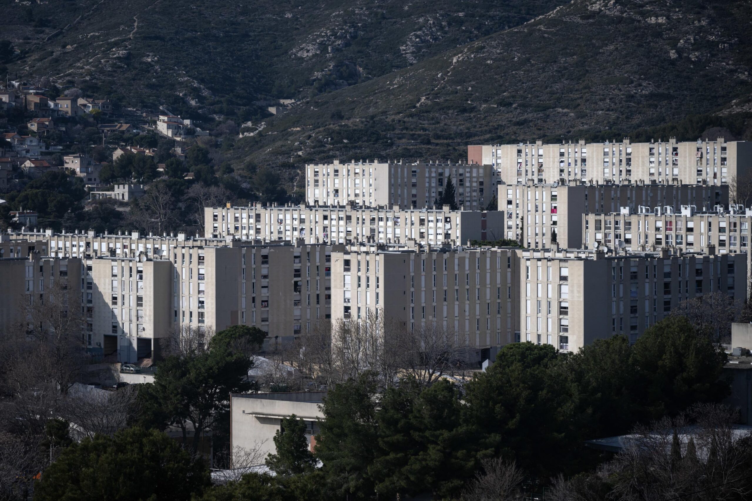 La Castellane, Marseille, shooting, drug trafficking, gang war, Place Nette XXL, organized crime, attempted murder, police investigation, La Bricarde, territorial control
