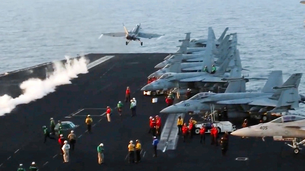 U.S. Navy, fighter jet, aircraft carrier, Red Sea, F/A-18F Super Hornet, USS Harry S. Truman, ejection, pilots, Strike Fighter Squadron (VFA) 11, arrestment failure, warplane overboard, minor injuries, flight deck, hangar bay, Harry S. Truman Carrier Strike Group, Carrier Air Wing 1, Destroyer Squadron 28, USS Gettysburg, Houthi terrorists, Yemen, ceasefire

