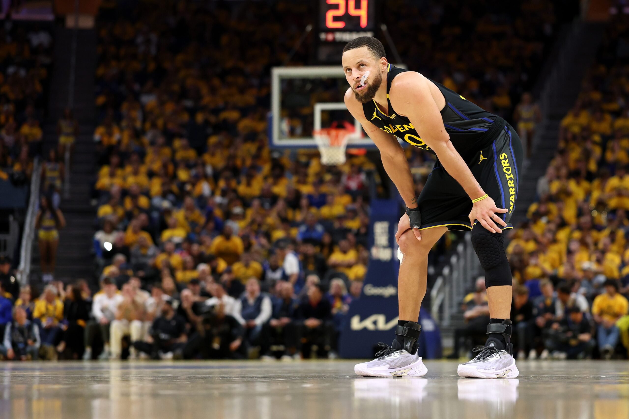 Stephen Curry injury, Warriors Game 2, Golden State Warriors, Minnesota Timberwolves, NBA Playoffs, hamstring strain, Curry out, Warriors playoff hopes, Jimmy Butler trade, Warriors defense.
