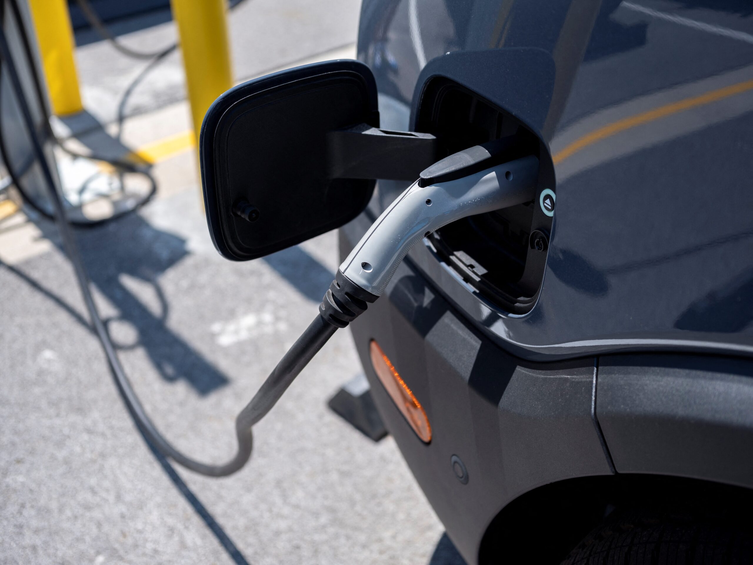 electric vehicles, EV charging stations, Trump administration, California lawsuit, Biden Inflation Reduction Act, Transportation Department, federal funding, clean energy, climate change, zero-emission vehicles, National Electric Vehicle Infrastructure Fund
