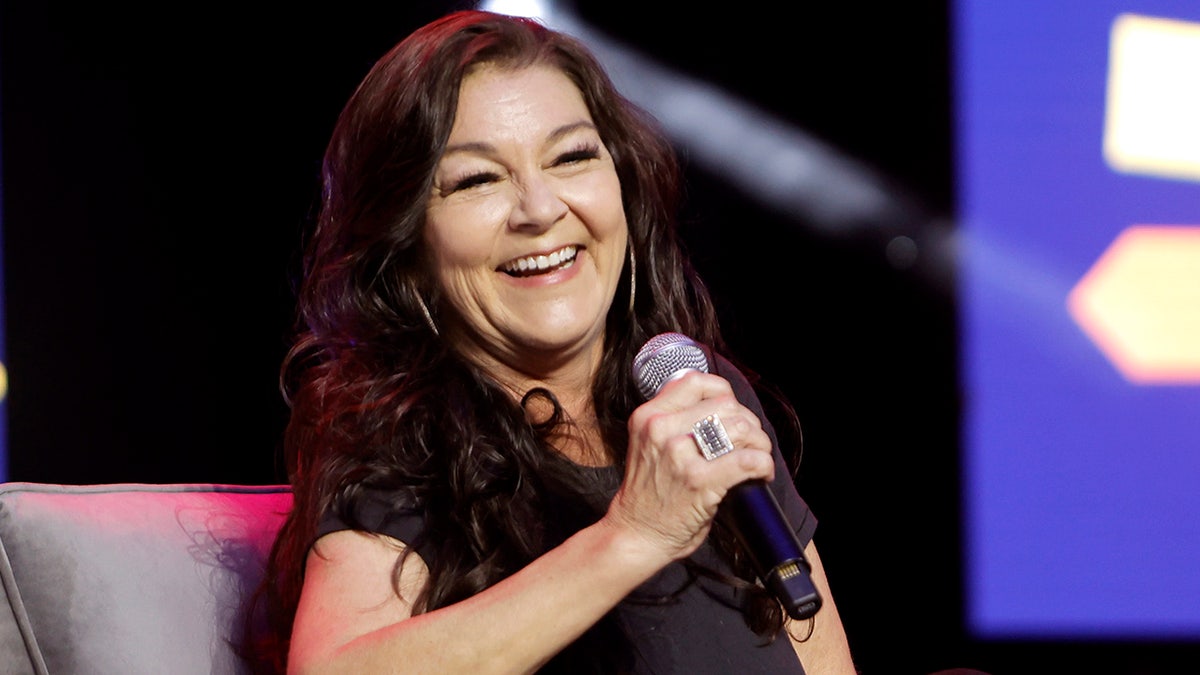 Gretchen Wilson, The Masked Singer, COVID, health issues, Blake Shelton, Keith Urban, Taylor Sheridan, Yellowstone, Brian Kelley, Florida Georgia Line, country music, Redneck Woman, singing competition, reality TV, entertainment news
