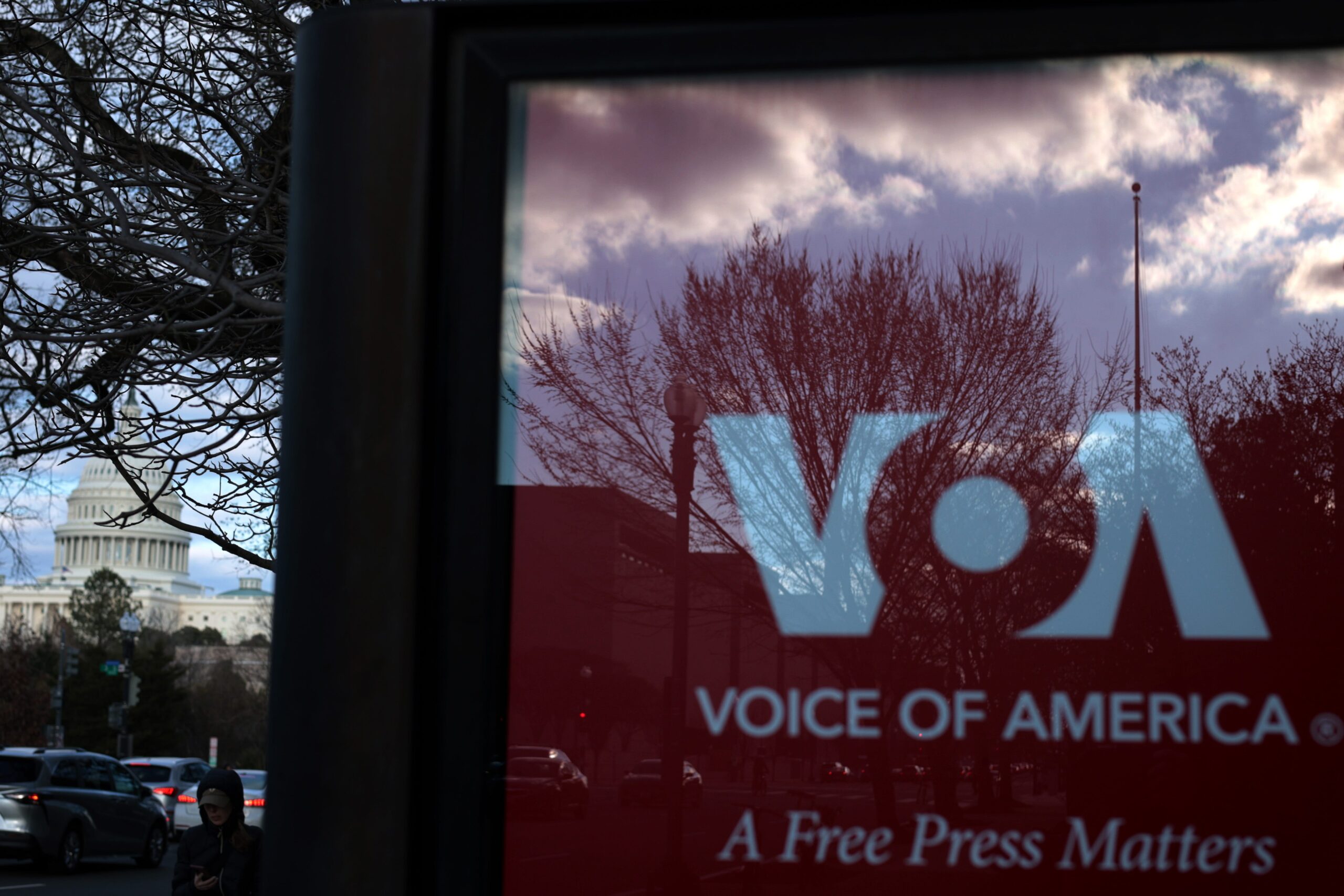 USAGM, Voice of America, Radio Free Europe, Radio Liberty, Japhet Quitzon, Center for Strategic & International Studies, VOA, RFE/RL, China, Russia, disinformation, propaganda, media, Donald Trump, budget, funding, soft power, Radio Free Asia, Myanmar, NPR, PBS, Corporation for Public Broadcasting, CPB, One America Network, Kari Lake, The Excerpt, podcast
