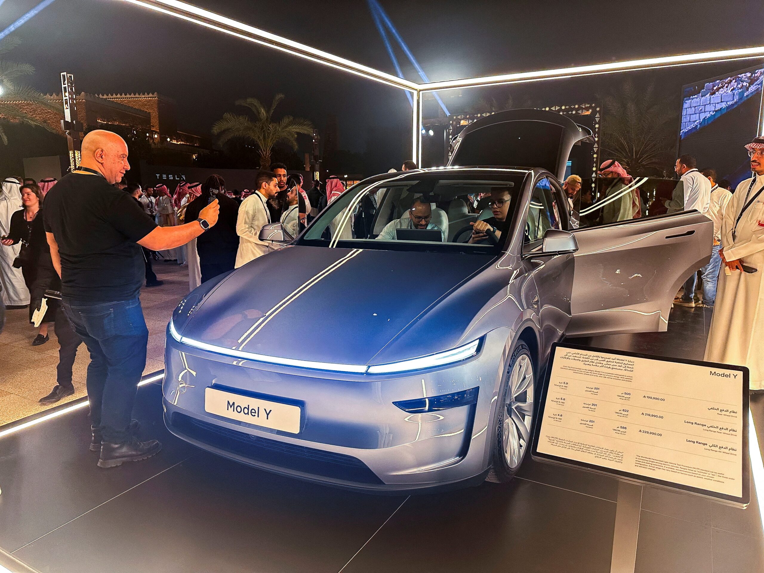 Tesla Model Y, 2025 Tesla Model Y, Model Y price, affordable electric SUV, electric vehicle tax incentive, Tesla sales, Elon Musk, Kia EV6, Hyundai Ioniq 5, Volkswagen ID.4, Chevrolet Equinox EV, electric SUV comparison, Model Y review, EV market, electric car, long range EV, rear-wheel drive, all-wheel drive, EV range, best-selling car, American-made car
