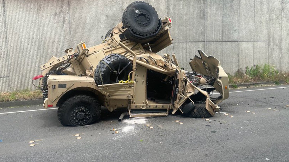 Humvee crash, Bellevue, Washington, Interstate 90, I-90, military vehicle, Yakima Training Center, Eastgate, Overlake Medical Center, Trooper Rick Johnson, car accident, minor injuries, retaining wall, traffic accident, convoy, Washington State Patrol
