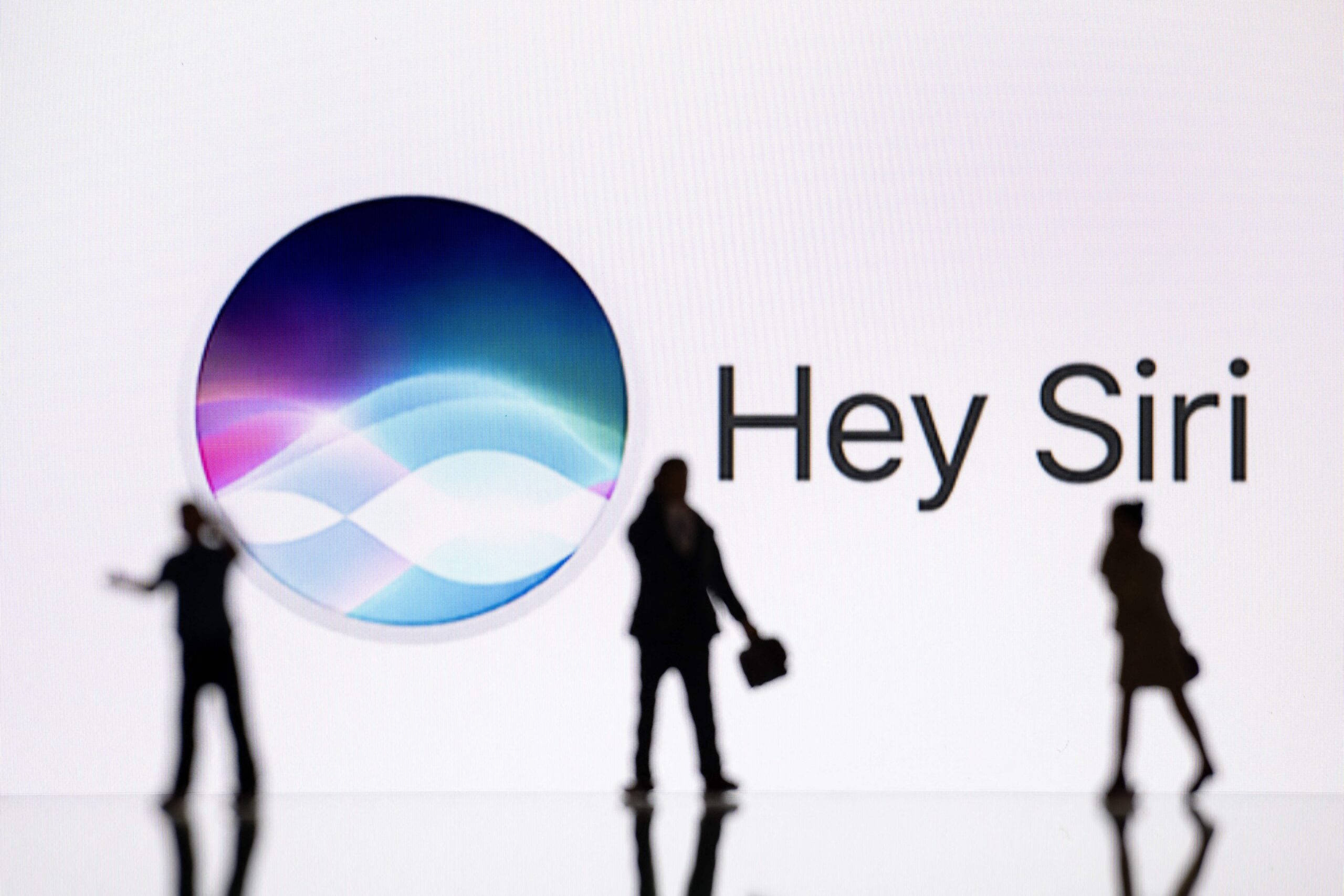 Apple, Siri, class action lawsuit, Lopez v. Apple, privacy, data breach, settlement, unintended Siri activation, voice assistant, iPhone, iPad, Apple Watch, MacBook, iMac, HomePod, iPod touch, Apple TV, confidential communications, third-party contractors, data sharing, claims process, eligibility, deadline, payments, $95 million, legal notice, opt-in, claim identification code, confirmation code, Lopez Voice Assistant Settlement website
