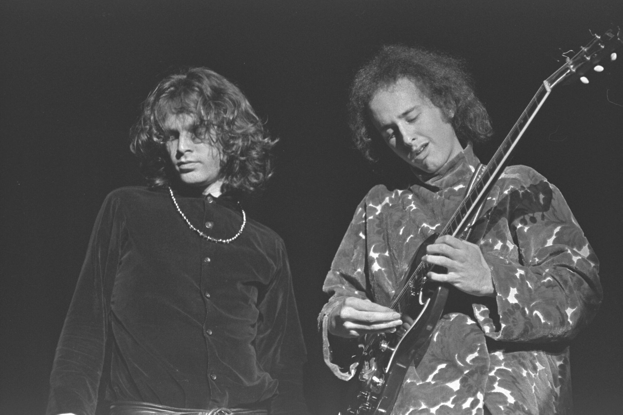 Robby Krieger, The Doors, Jim Morrison, Night Divides the Day, The Doors Anthology, Rock and Roll, Music, Biography, Book Review, Genesis Publications, John Densmore, Ray Manzarek, Rock History, 1960s Music, Los Angeles, Whiskey A Go Go, Rock and Roll Hall of Fame, Music Legends, Rock Music History
