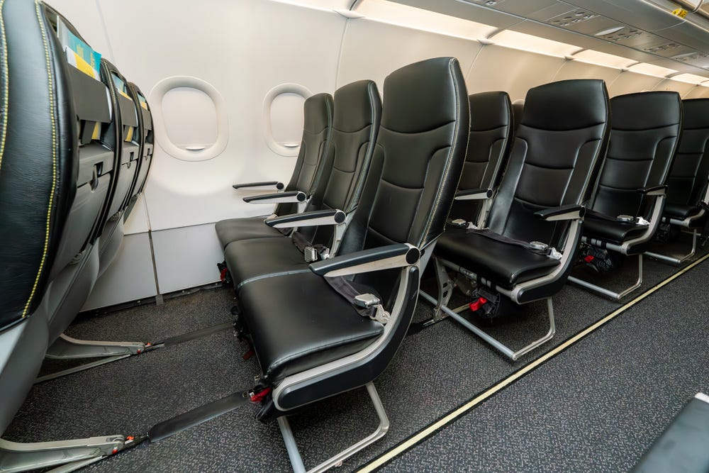 Spirit Airlines, extra legroom, Go Comfy, airline seats, loyalty program, flight upgrades, budget travel, Rana Ghosh, Zach Wichter, airline news, summer travel, 2025, seat pitch, travel deals, airline perks, air travel

