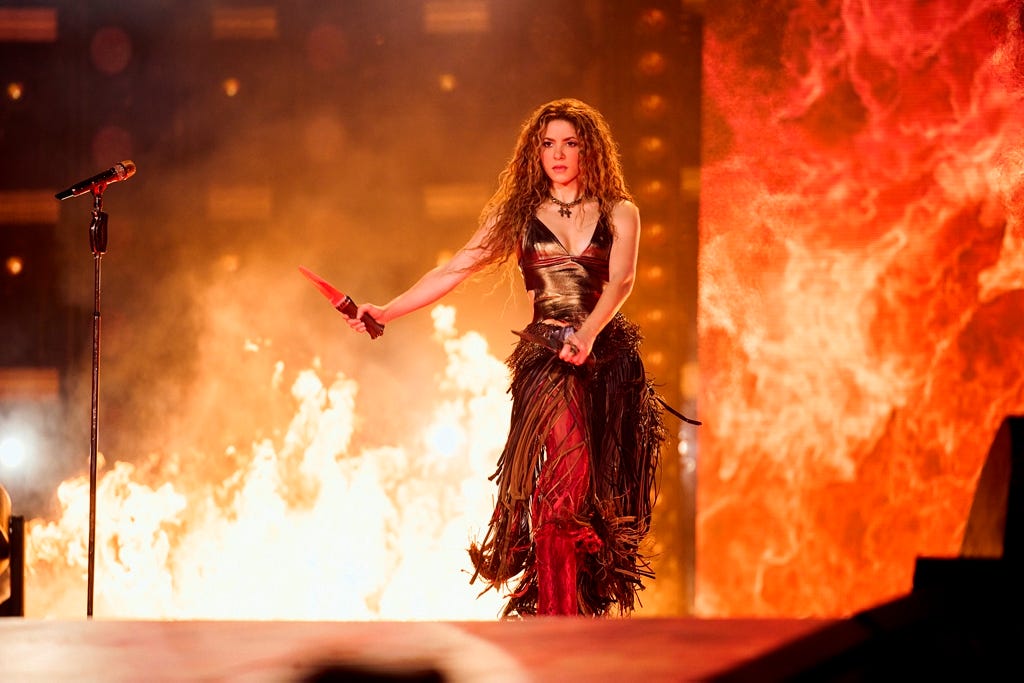 Shakira, Latin music, world tour, Las Mujeres Ya No Lloran, Grammy Awards, Latin Grammy Awards, North America, stadium show, Bank of America Stadium, Charlotte, Taylor Swift, Mexico City, Estadio GNP Seguros, Wyclef Jean, Alejandro Sanz, Milán, Sasha, Bad Bunny, Met Gala, Jimmy Fallon, Underneath Your Clothes, Hips Don't Lie, Whenever Wherever, reggaeton, Puerto Rico, Bizarrap, Shakira: Bzrp Music Sessions, Vol. 53, crossover success, Ricky Martin, Enrique Iglesias, La Tortura, Colombian artist, female artist, music interview, concert review, pop music, bachata, rock music, Cardi B, Karol G, Rauw Alejandro, new album, music industry, artist profile, motherhood, children, Kendrick Lamar, music influence, Spanish music, Latin stars
