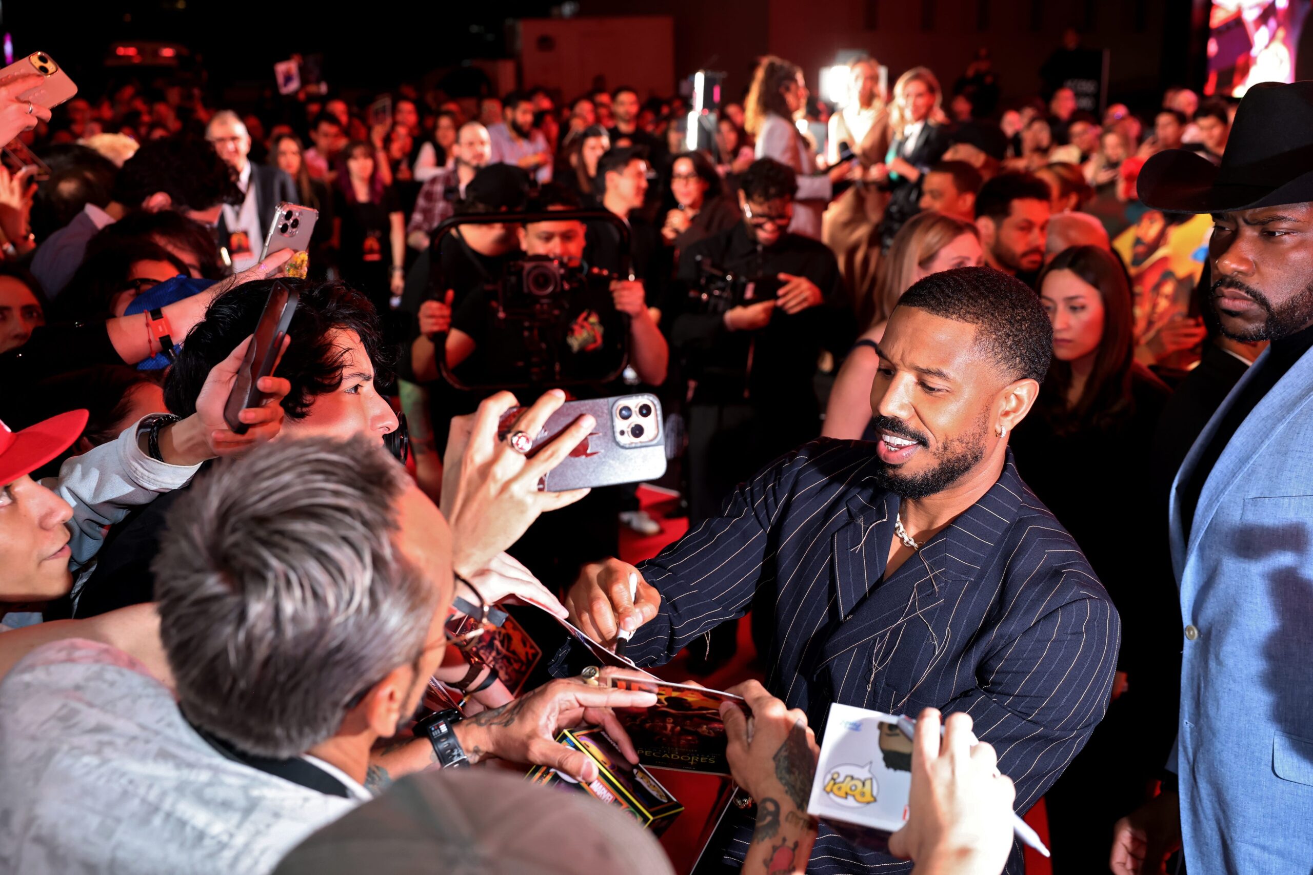 Ryan Coogler, Sinners, IMAX 70mm, Michael B. Jordan, vampire movie, Club Juke, movie theaters, film format, high resolution, moviegoing experience, box office hit, 70mm film, Christopher Nolan, Emma Thomas, large-format photography
