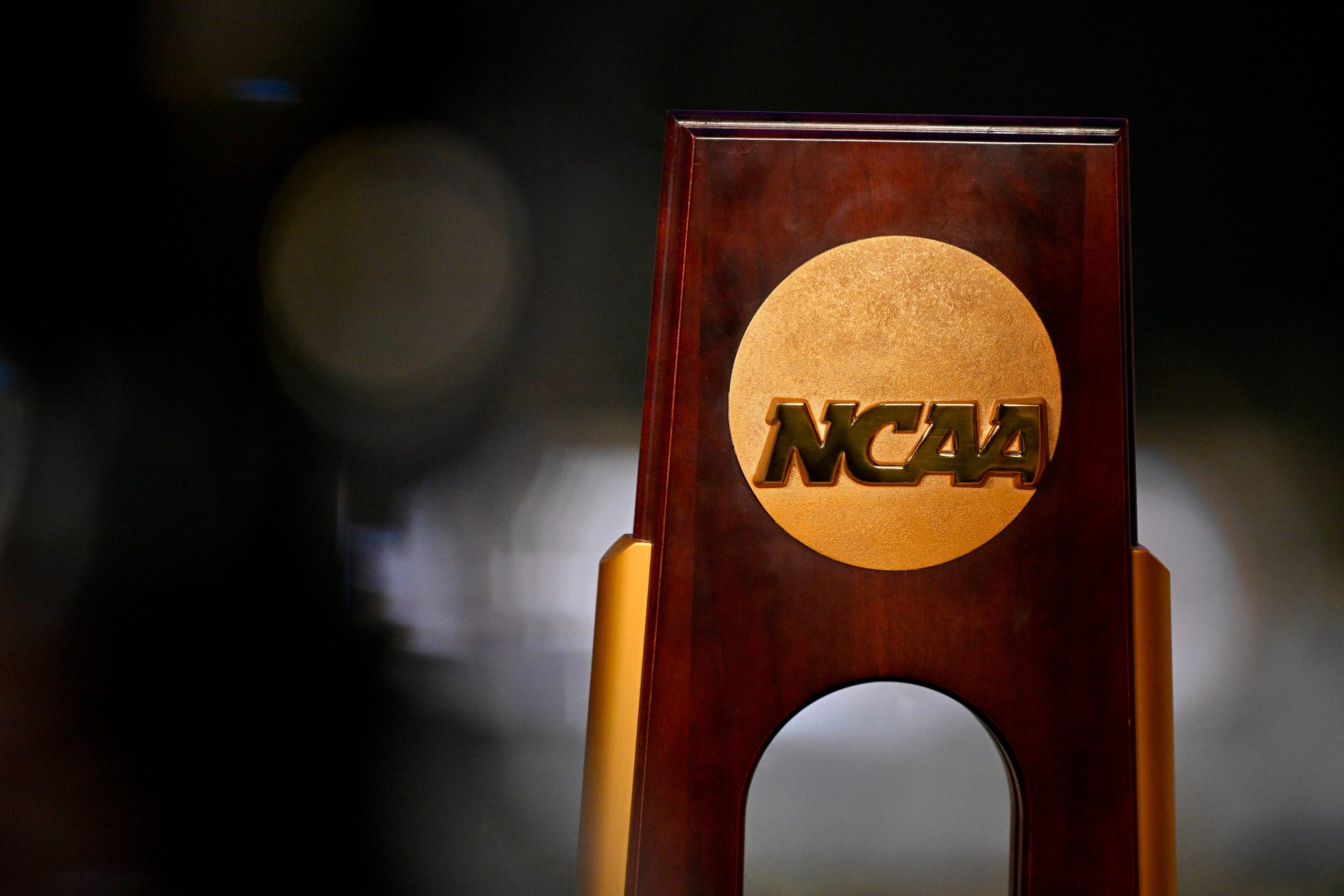 NCAA settlement, athlete compensation, antitrust, Power Five conferences, roster limits, NIL, name image likeness, Claudia Wilken, objectors, grandfathering, student-athletes, college sports, legal challenge
